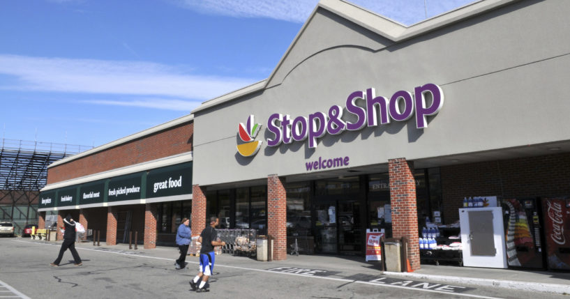 People walk outside a Stop & Shop grocery store in Newport, Rhode Island, on Feb. 13, 2012.