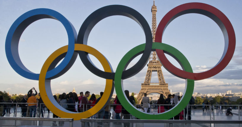 The Olympic rings are set up at Trocadero plaza that overlooks the Eiffel Tower in Paris, on Sept. 14, 2017.