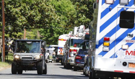 First responder vehicles are pictured in a Charlotte neighborhood where an officer-involved shooting took place in Charlotte, North Carolina, on April 29.
