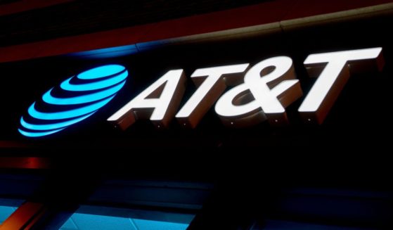 The AT&T logo is displayed at a store in Washington on Jan. 18, 2022.