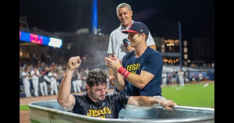 Brewer Hicklen, an outfielder with the Nashville Sounds, baptizes his teammate, Wes Clarke, after a game on Saturday. (Wes Clarke / Instagram)