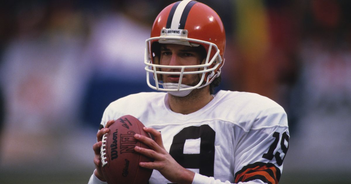 Then-quarterback Bernie Kosar of the Cleveland Browns looks on from the field before a game in Cleveland, Ohio, in 1985.