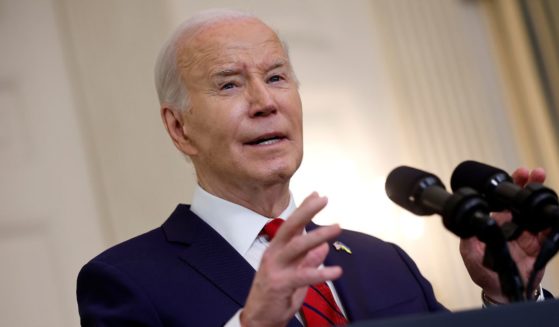President Joe Biden speaks in the State Dining Room of the White House in Washington on April 24.