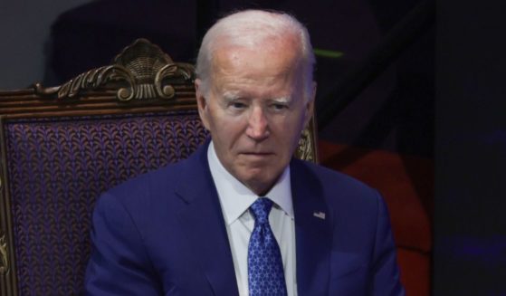 President Joe Biden listens during a campaign stop at Mount Airy Church of God in Christ in Philadelphia on Sunday.