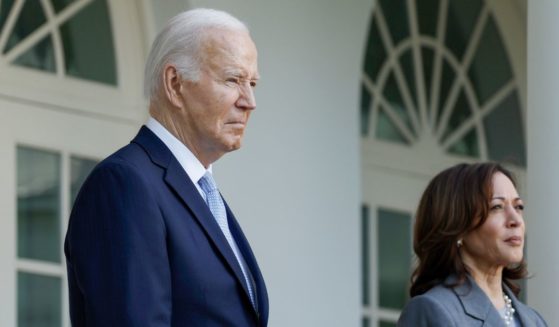 President Joe Biden and Vice President Kamala Harris look on during an event in the Rose Garden of the White House in Washington on May 20.