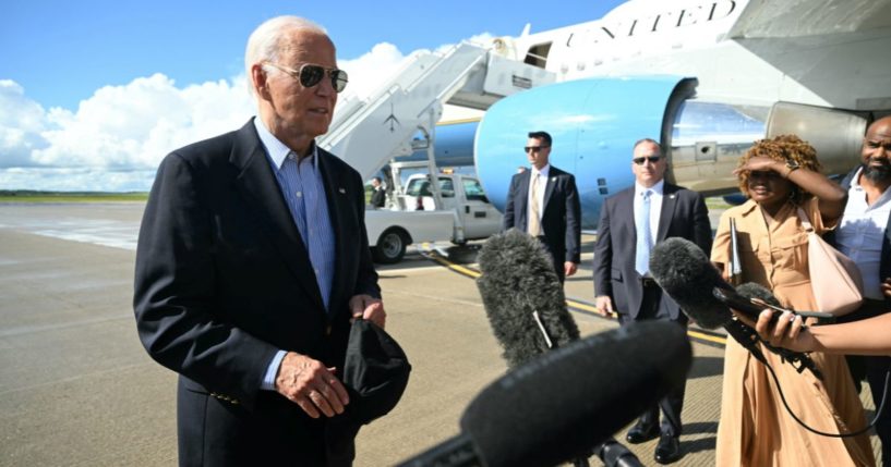 President Joe Biden speaks to reporters before boarding Air Force One in Madison, Wisconsin, on Friday.