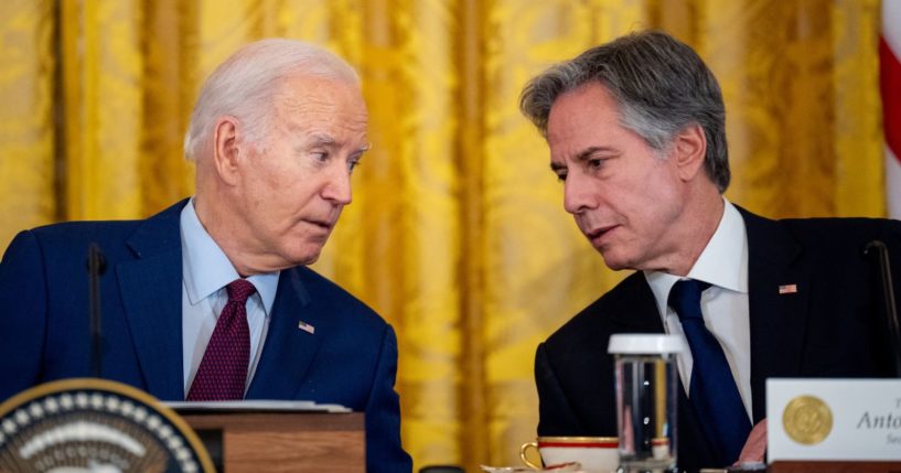 President Joe Biden, left, and Secretary of State Antony Blinken, right, speak during a trilateral meeting with Japanese Prime Minister Fumio Kishida and Filipino President Ferdinand Marcos in the East Room of the White House in Washington, D.C., on April 11.