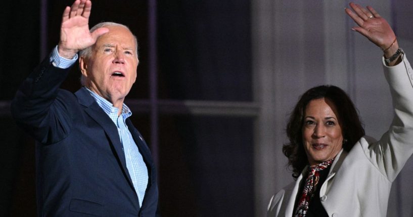 President Joe Biden, left, and Vice President Kamala Harris, right, wave after watching the Independence Day fireworks display from the Truman Balcony of the White House in Washington, D.C., on Thursday.