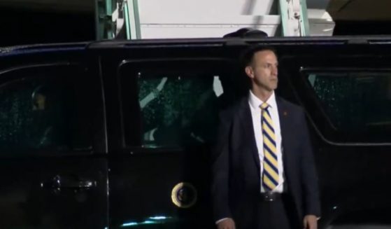 President Joe Biden appears to struggle to get into a vehicle.