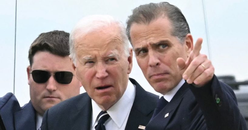 President Joe Biden talks with his son Hunter Biden upon arrival at Delaware Air National Guard Base in New Castle, Delaware, on June 11.