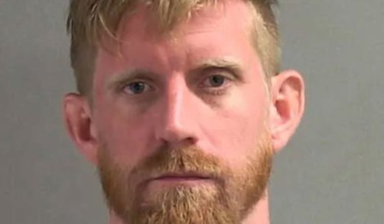 Brandon Gilmore allegedly dropped a 4-year-old child off a balcony in Daytona Beach, Florida, in an attempt to "scare him a little bit."