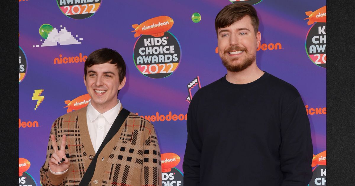 Ava Kris Tyson, left, who was then known as Chris Tyson, is seen with YouTube host MrBeast, whose real name is Jimmy Donaldson, at Nickelodeon's Kids' Choice Awards 2022 at Barker Hangar in April 2022 in Santa Monica, California.