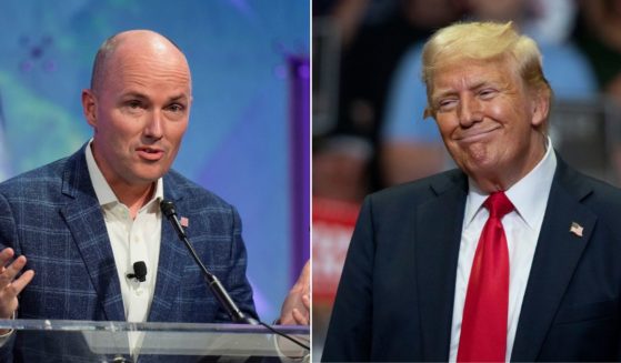 At left, Utah Gov. Spencer Cox speaks at the summer meeting of the National Governors Association in Salt Lake City on July 11. At right, Republican presidential nominee and former President Donald Trump looks on during a rally at the Van Andel Arena in Grand Rapids, Michigan, on Saturday.