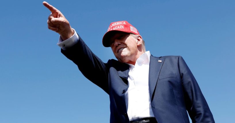 Former President Donald Trump gestures to the crowd at a rally in Chesapeake, Virginia, on June 28.