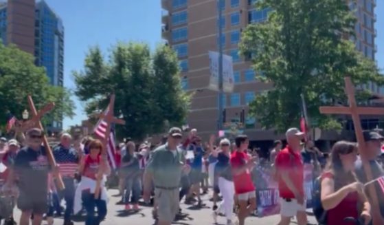 Officials in Coeur d'Alene, Idaho, tried to ban crosses from the Fourth of July Parade on Thursday, but after backlash, they gave in, with several people carrying crosses during the procession.