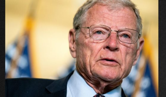 Then-Oklahoma GOP Sen. Jim Inhofe is seen speaking to reporters April 13, 2021, on Capitol Hill in Washington, D.C. Inhofe, who left office in 2023, died Tuesday.