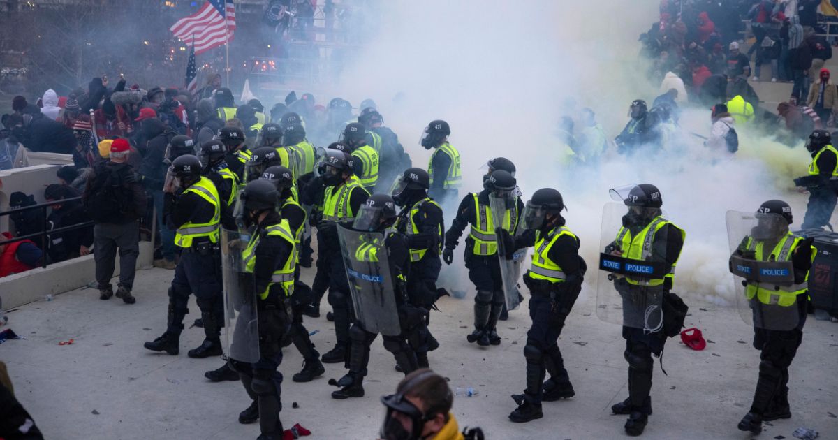 Capitol police use pepper spray and tear gas at the Capitol on Jan. 6, 2021.