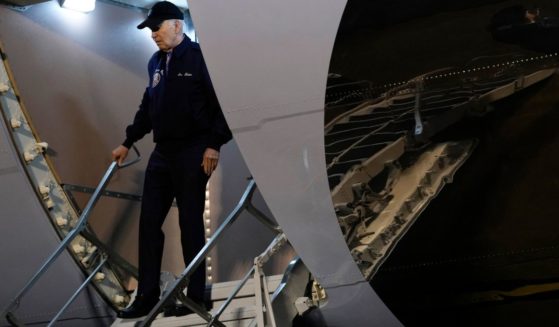 President Joe Biden steps off Air Force One upon arrival at Dover Air Force Base in Dover, Delaware, on Wednesday.