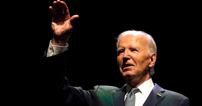 President Joe Biden waves on stage during the Vote To Live Properity Summit in Las Vegas, Nevada, on Tuesday.