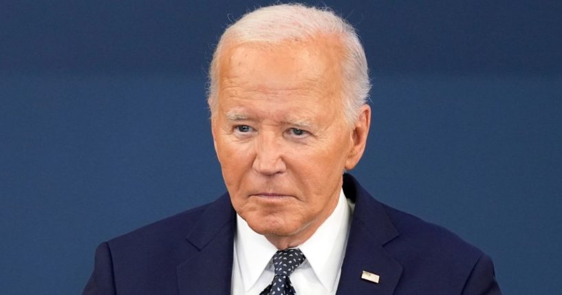 President Joe Biden listens during a visit to the D.C. Emergency Operations Center in Washington on Tuesday.