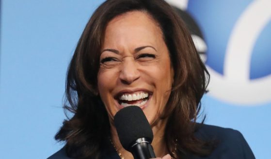 Then-Democratic presidential candidate Sen. Kamala Harris laughs at a Democratic presidential forum on Latino issues in Los Angeles, California, on Nov. 17, 2019.