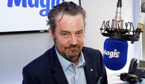 Matthew Perry poses for pictures at Magic Radio in London, England, on April 1, 2015.