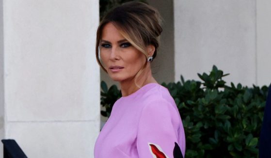 Former first lady Melania Trump arrives at the home of billionaire investor John Paulson in Palm Beach, Florida, on April 6.