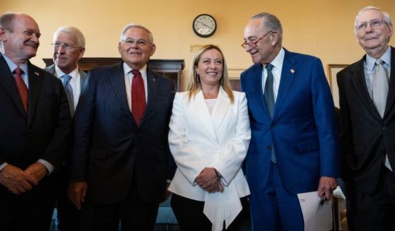 Italian Prime Minister Giorgia Meloni, center, stands with, from left, Sens. Chris Coons, Roger Wicker, Robert Menendez, Chuck Schumer and Mitch McConnell before a meeting at the U.S. Capitol in Washington on July 27, 2023.