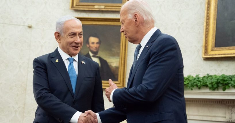 Israeli Prime Minister Benjamin Natanyahu, left, shakes the hand of President Joe Biden, right, during a meeting at the White House in Washington, D.C., on Thursday.