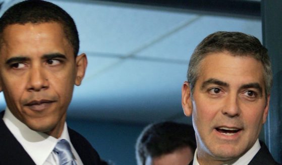 Then-Sen. Barack Obama and George Clooney arrive for the National Press Club Newsmaker's Program in Washington, D.C., on April 27, 2006.