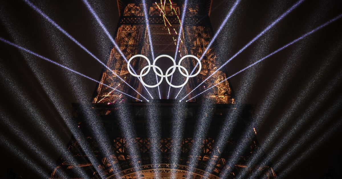 A light show takes place as The Olympic Rings on the Eiffel Tower are illuminated during the opening ceremony of the Olympic Games Paris 2024 in Paris, France, on Friday.