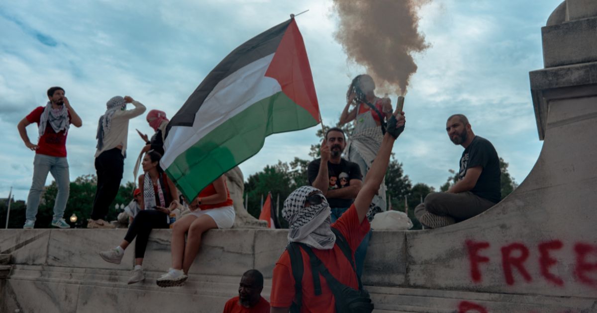 A pro-Palestinian protester waves the Palestine flag outside of the U.S. Capitol in Washington, D.C., on Wednesday.