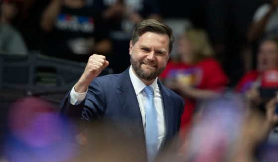 Republican vice presidential nominee U.S. Sen. J.D. Vance (R-OH) pumps his fist at the first public rally with his running mate, former U.S. President Donald Trump.