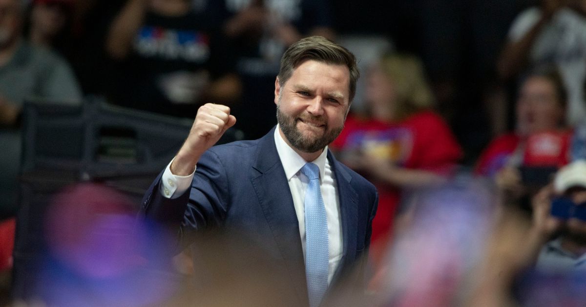 Republican vice presidential nominee U.S. Sen. J.D. Vance (R-OH) pumps his fist at the first public rally with his running mate, former U.S. President Donald Trump.