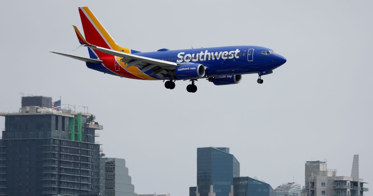 A Southwest Airlines Boeing 737-7H4 approaches San Diego International Airport for a landing from Houston in a file photo taken June 28 in San Diego, California.