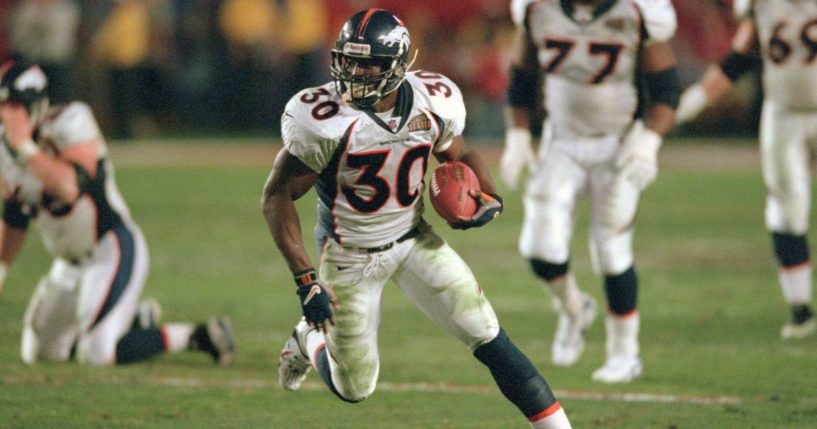 Terrell Davis of the Denver Broncos carries the ball against the Atlanta Falcons in Super Bowl XXXIII at Pro Player Stadium in Miami on Jan. 31, 1999.