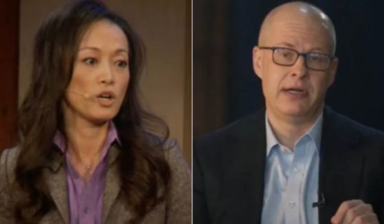 Sue Mi Terry, left, who once worked on the National Security Council, was charged with spying for South Korea on Tuesday. She is married to Washington Post columnist Max Boot, right.