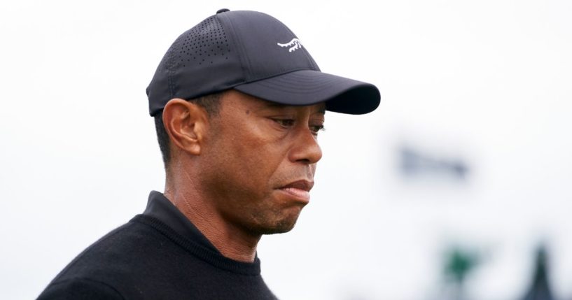 Tiger Woods walks the course during a practice round prior to the 152nd British Open at Royal Troon in Scotland on Wednesday.