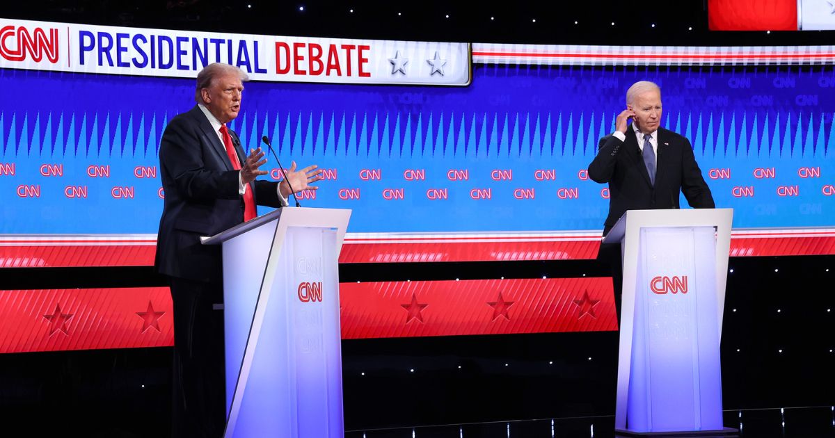 Republican presidential candidate and former President Donald Trump, left, and President Joe Biden participate in the CNN presidential debate at the network's studios in Atlanta on Thursday.