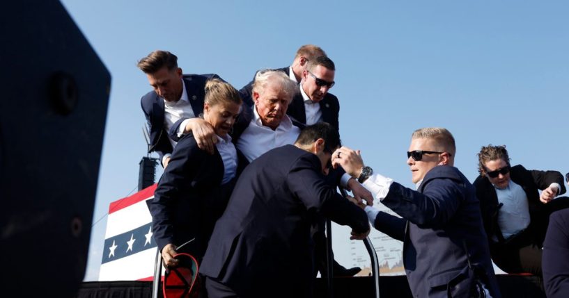 Republican presidential candidate and former President Donald Trump is rushed offstage after an assassination attempt during a rally in Butler, Pennsylvania, on Saturday.