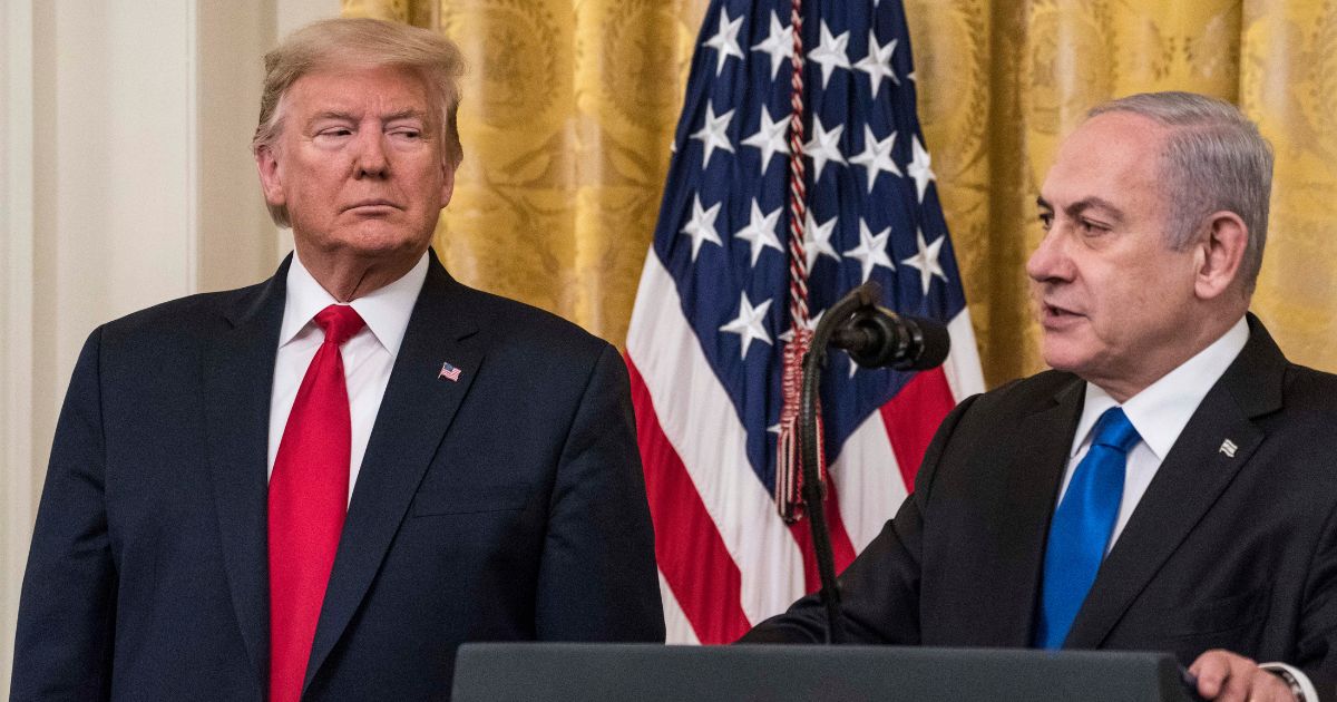 Then-President Donald Trump and Israeli Prime Minister Benjamin Netanyahu appear together in the East Room of the White House in Washington on Jan. 28, 2020.