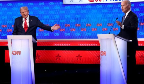 Former President Donald Trump, left, gestures to President Joe Biden, right, during the first presidential debate in Atlanta, Georgia, on Thursday.