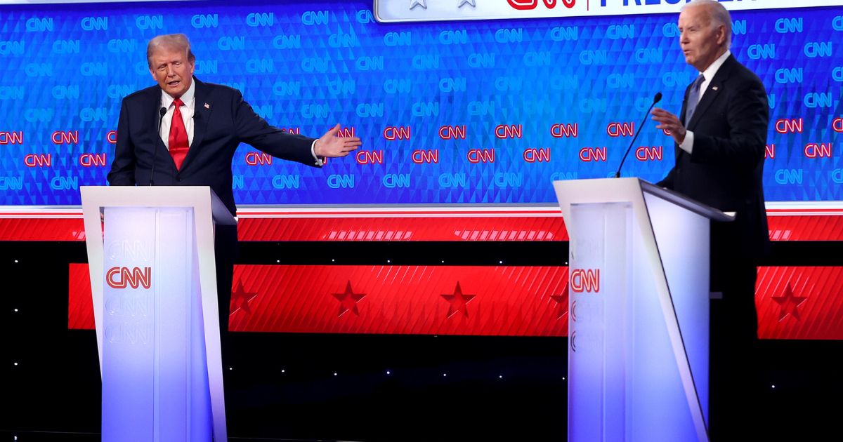 Former President Donald Trump, left, gestures to President Joe Biden, right, during the first presidential debate in Atlanta, Georgia, on Thursday.