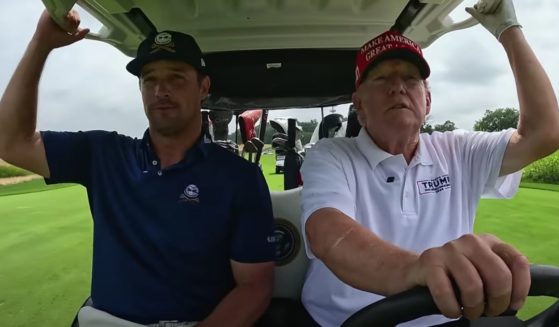 Former President Donald Trump, right, played a round of golf with Bryson DeChambeau, left, at Trump National Golf Club Bedminster in New Jersey for his “Break 50” challenge on YouTube, which was released on Tuesday.