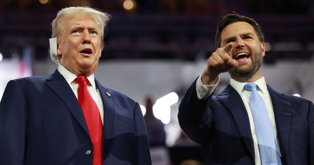 Former President Donald Trump, left, and Republican Vice Presidential candidate J.D. Vance, right, appear on the first day of the Republican National Convention in Milwaukee, Wisconsin, on Monday.