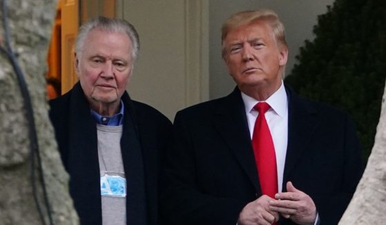 Then-President Donald Trump, right, stands with actor Jon Voight, left, outside the Oval Office before departing from the South Lawn of the White House in Washington, D.C., on Jan. 28, 2020.