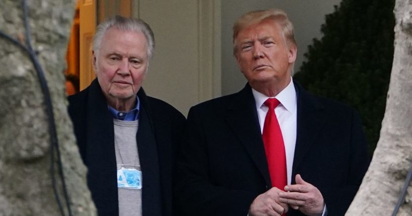 Then-President Donald Trump, right, stands with actor Jon Voight, left, outside the Oval Office before departing from the South Lawn of the White House in Washington, D.C., on Jan. 28, 2020.