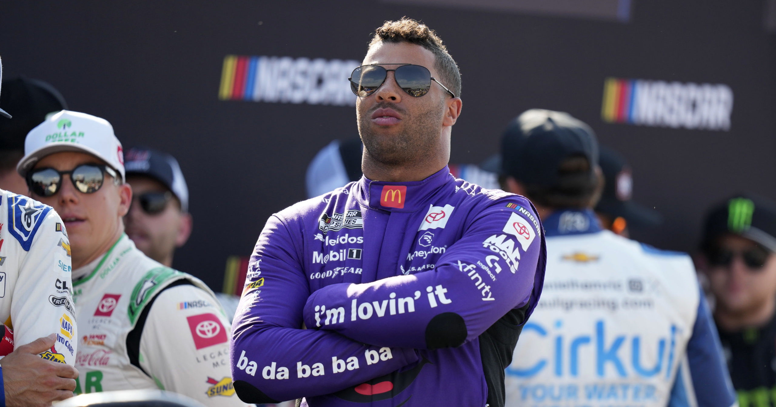 Bubba Wallace looks on before driver introductions at a NASCAR Cup Series auto race, Sunday, June 16, 204 at Iowa Speedway in Newton, Iowa.
