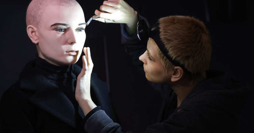 In this undated handout photo provided by The National Wax Museum Plus, Artistic Coordinator Mel Creek applies the finishing touches on a wax figure of the late singer Sinead O'Connor, at the National Wax Museum Plus in Dublin, Ireland.