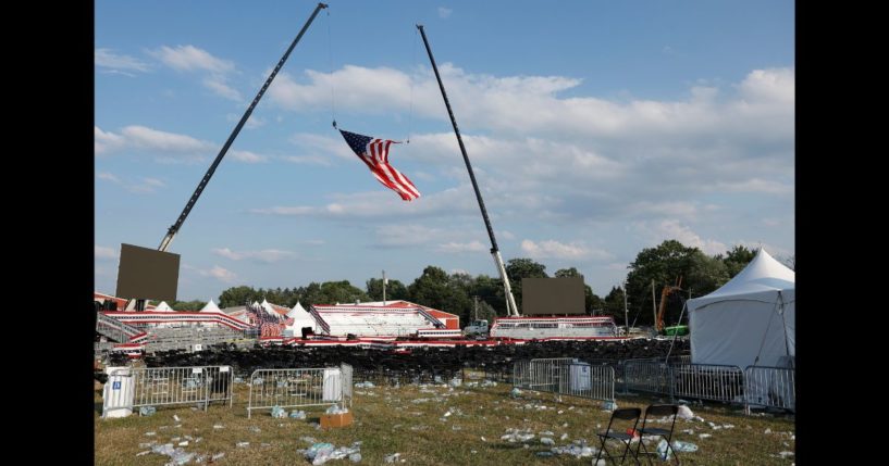 Campaign signs and empty water bottles are seen on the ground of a campaign rally for Republican presidential candidate former President Donald Trump on July 13, 2024 in Butler, Pennsylvania.